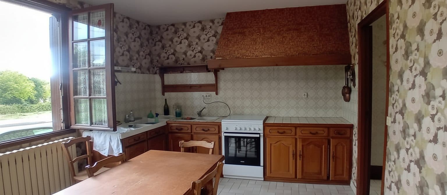 Maison ancienne avec fort potentiel, idéale pour un projet de rénovation.